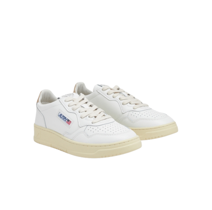 Autry Medalist Low Sneakers in White and Gold Leather